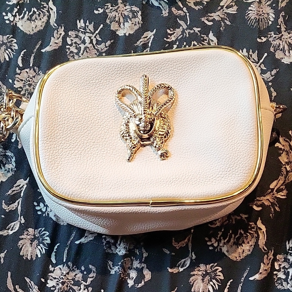 Elegant Pink Crossbody Bag with Gold Accents